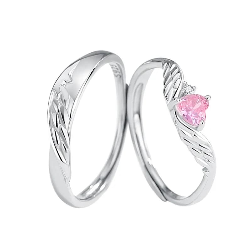 Susurro de Ángel: Anillo de Pareja con Alas y Circonita Rosa