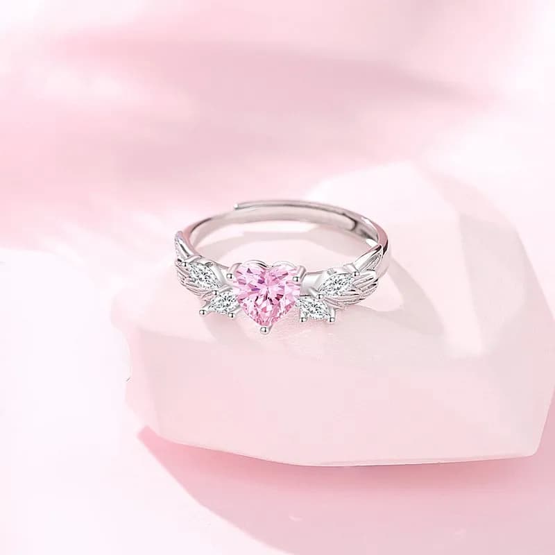 AMOR CELESTIAL: ANILLOS DE PAREJA EN PLATA 925 CON ALAS DE ÁNGEL Y CORAZÓN ROSA 2